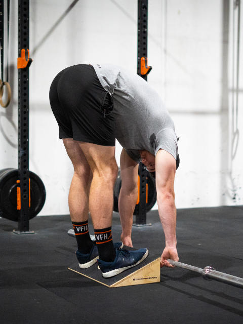 Slant board for weight lifting and CrossFit training