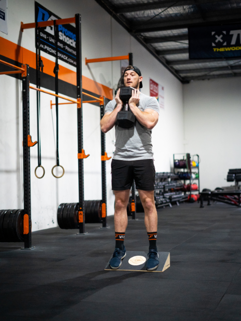 Slant board for weight lifting and CrossFit training