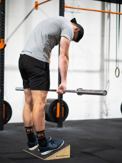 Slant board for weight lifting and CrossFit training