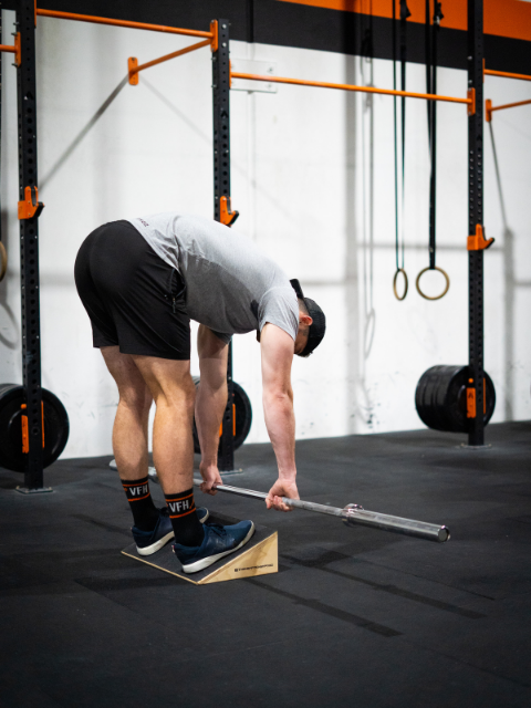 Slant board for weight lifting and CrossFit training
