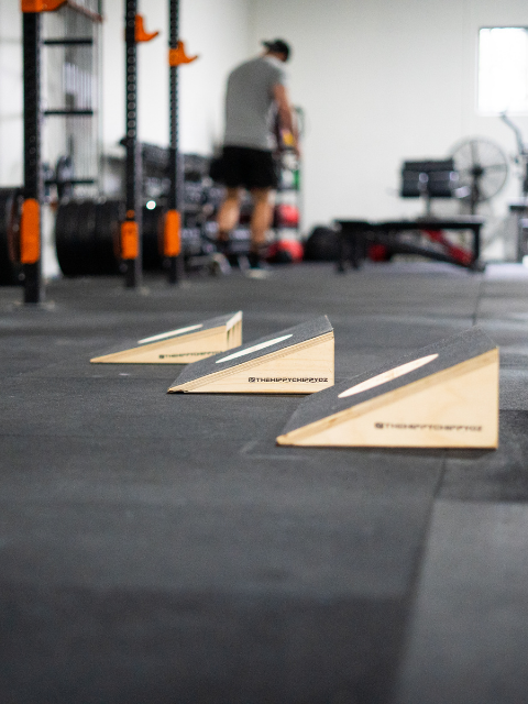 Slant board for weight lifting and CrossFit training